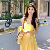 Gentle Wind Yellow Hanging Dress Women 2026 Summer New Tea Break French Fresh Sweet Orange Tnut Dress