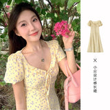 French Lotus Side Bubble Sleeve Yellow Broken Flower Dress Dress Women's Summer 2025 New Design Feeling Waist Skirt