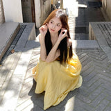 Gentle Wind Yellow Hanging Dress Women 2026 Summer New Tea Break French Fresh Sweet Orange Tnut Dress