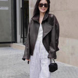 Haining New Leather Locomotive Jacket Loose Leather Jacket 2026 Autumn New Stumbling Double Collar Short Coat Woman
