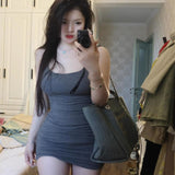 Fashion Pure Windy Sexy Sling Dress Femininity Design Reveals Back Tight Bag Ass Skirt