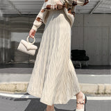 KANING Long Wave Ling Knitted Umbrella Skirt 2026 Autumn New A-Shaped Skirt High-Waist Knitted Skirt