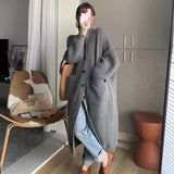 Korean Version Of The Lazy Wind In The Long Knitted Cardigan Women 2026 Autumn And Winter Atmosphere Thicker Sweater Jacket