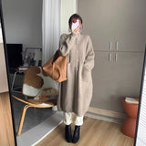 Korean Version Of The Lazy Wind In The Long Knitted Cardigan Women 2026 Autumn And Winter Atmosphere Thicker Sweater Jacket