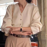 KANING French Solid Color V-Neck Knitted Cardigan Women 2026 Early Autumn Wearing A New Design Sweater Outside The Female