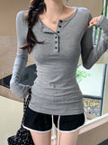Spice Girls Button Slim Thin Long-Sleeved T-Shirted Women 2026 Spring And Autumn Simple Inside The Shoulder Student Top
