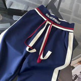 Fashion Leisure Sports Suit Women's Early Autumn Explosion Of The Street Atmosphere Thin Open-Shirt Broad Leg Pants Two Sets #807