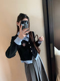 College Wind Fake Two Shirt Women 2026 Spring And Autumn Korean New Polo Collar Hit The Niche Thin Top