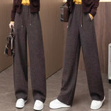Spring And Autumn Casual Wind With Solid Color Pumping Rope With Pocket Broad Leg Pants Women Loose Waist Loose Straight Trousers