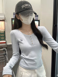 Korean Version Of Small Embroidery Shoulder Long Sleeve Bottom Shirt Women's 2026 Early Autumn Button U Neck T-Shirt Milk Blue Top