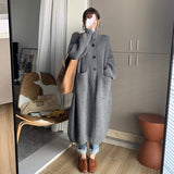 Korean Version Of The Lazy Wind In The Long Knitted Cardigan Women 2026 Autumn And Winter Atmosphere Thicker Sweater Jacket