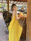 Seaside Vacation Sexy Bare Back Sling Dress Women's New Summer Loose A Skirt Gentle Yellow Long Dress