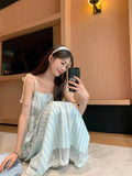 Gentle Wind Seaside Resort Striped Slinged Dress Women's Summer New French Temperament Loose Little One-Child Dress