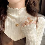 KANING Solid-Colored Semi-High-Necked Knitted Shirt 2026 Autumn And Winter New Wood Ear-Sideded Sweater