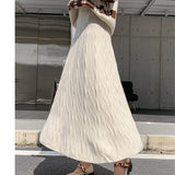 KANING Long Wave Ling Knitted Umbrella Skirt 2026 Autumn New A-Shaped Skirt High-Waist Knitted Skirt